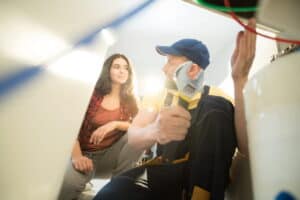 plumber-explaining-reason-of-clogged-drains